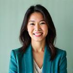 Professional portrait of Alice Chen, a certified holistic nutritionist, smiling warmly.